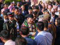 Nepal's new Chief Justice Prakashman Singh Raut is welcomed by Supreme Court justices and officials upon his arrival at the Supreme Court pr...