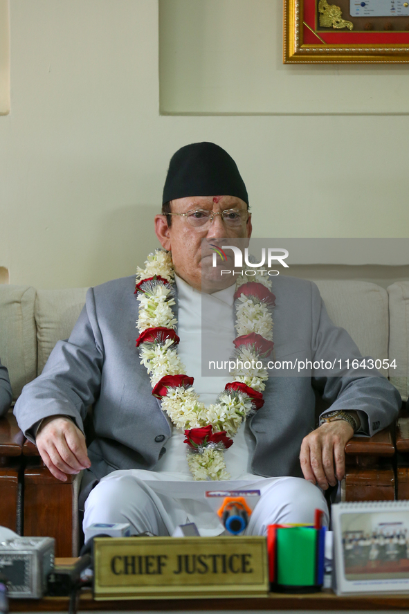 Nepal's new Chief Justice Prakashman Singh Raut chairs a press meet at the Supreme Court after taking charge of office in Kathmandu, Nepal,...