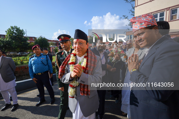 Nepal's new Chief Justice Prakashman Singh Raut (Center) arrives at the Supreme Court premises to take charge of office in Kathmandu, Nepal,...