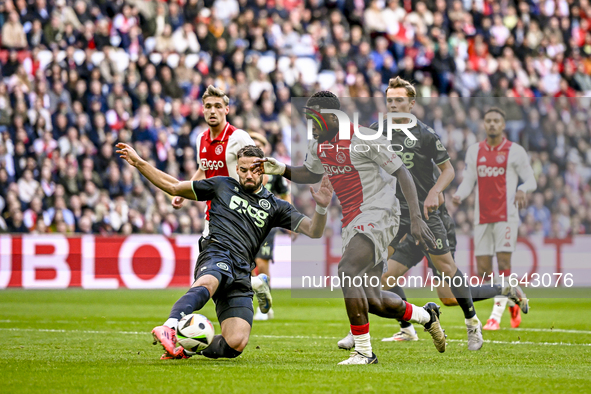 FC Groningen defender Marco Rente and AFC Ajax Amsterdam forward Brian Brobbey play during the match between Ajax and Groningen at the Johan...