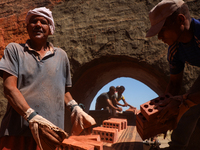 Red brick factory workers in Fayoum, Egypt, on October 5, 2024. (