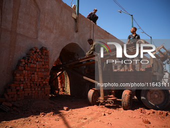 Red brick factory workers in Fayoum, Egypt, on October 5, 2024. (