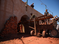 Red brick factory workers in Fayoum, Egypt, on October 5, 2024. (