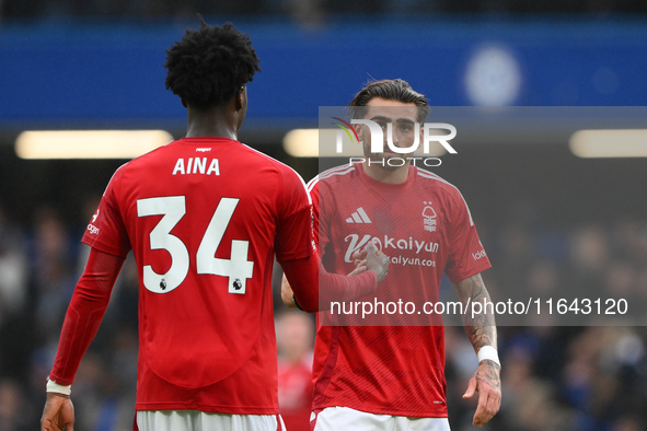 Ola Aina of Nottingham Forest and Jota Silva of Nottingham Forest shake hands during the Premier League match between Chelsea and Nottingham...