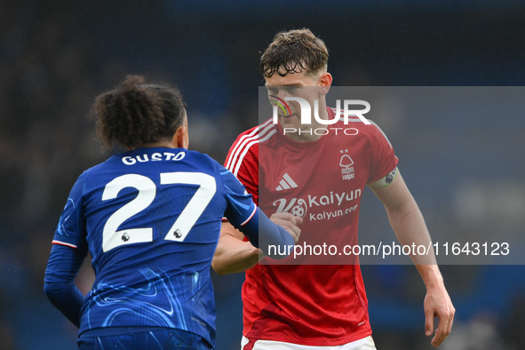 Ryan Yates of Nottingham Forest shakes hands with Malo Gusto of Chelsea after the final whistle during the Premier League match between Chel...