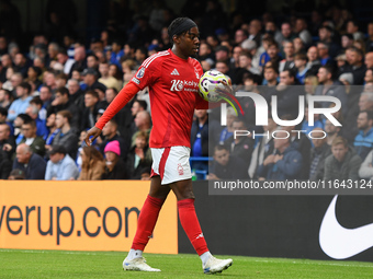 Anthony Elanga of Nottingham Forest walks over to take a corner kick during the Premier League match between Chelsea and Nottingham Forest a...