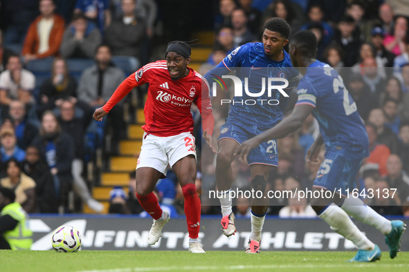 Anthony Elanga of Nottingham Forest is under pressure from Wesley Fofana and Moises Caicedo of Chelsea during the Premier League match betwe...