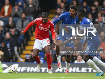 Anthony Elanga of Nottingham Forest is under pressure from Wesley Fofana and Moises Caicedo of Chelsea during the Premier League match betwe...