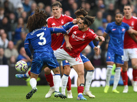 Jota Silva of Nottingham Forest wins the ball from Marc Cucurella of Chelsea during the Premier League match between Chelsea and Nottingham...