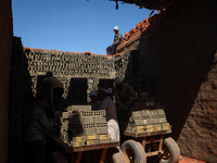 Red brick factory workers in Fayoum, Egypt, on October 5, 2024. (