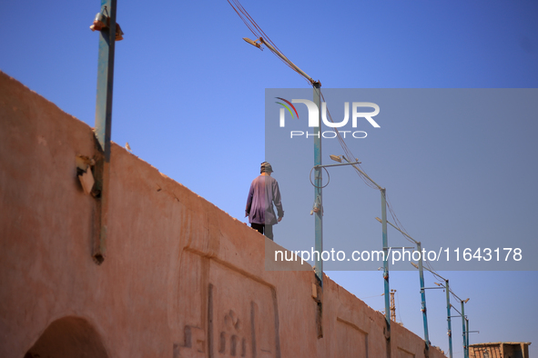 Red brick factory workers in Fayoum, Egypt, on October 5, 2024. 