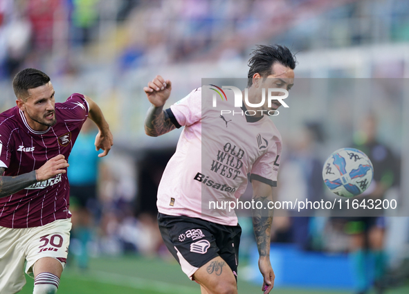 Francesco Di Mariano of Palermo FC is in action during the Serie B match between Palermo and Salernitana at the Stadio ''Renzo Barbera'' in...