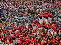 Members of the colla Nens del Vendrell build a human tower during the Concurs de Castells competition in Tarragona, Spain, on October 6, 202...