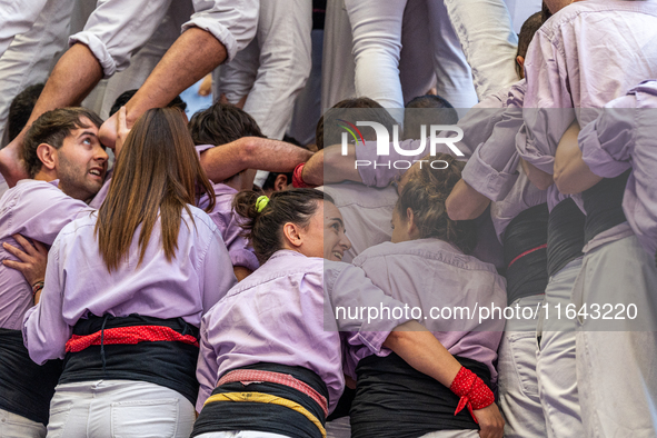 Members of Colla Jove Xiquets de Tarragona build a human tower during the Concurs de Castells competition in Tarragona, Spain, on October 6,...