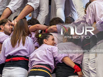 Members of Colla Jove Xiquets de Tarragona build a human tower during the Concurs de Castells competition in Tarragona, Spain, on October 6,...