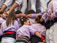 Members of Colla Jove Xiquets de Tarragona build a human tower during the Concurs de Castells competition in Tarragona, Spain, on October 6,...