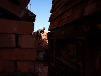 Red brick factory workers in Fayoum, Egypt, on October 5, 2024. (