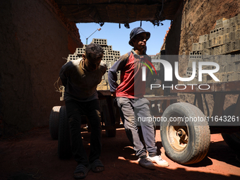 Red brick factory workers in Fayoum, Egypt, on October 5, 2024. (