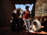 Red brick factory workers in Fayoum, Egypt, on October 5, 2024. (