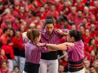 Members of the colla Moixiganguers d'Igualada build a human tower during the Concurs de Castells competition in Tarragona, Spain, on October...