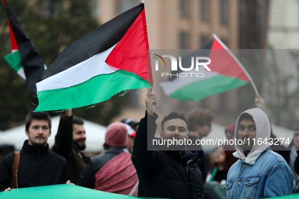 Participants in a pro-Palestinian protest gather on the Main Square and then proceed to the US Consulate and the Jagiellonian University in...