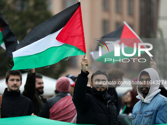 Participants in a pro-Palestinian protest gather on the Main Square and then proceed to the US Consulate and the Jagiellonian University in...