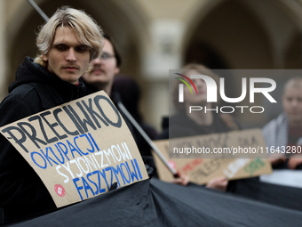 Participants in a pro-Palestinian protest gather on the Main Square and then proceed to the US Consulate and the Jagiellonian University in...