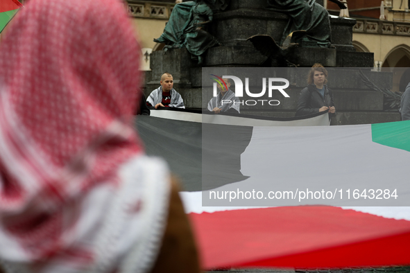 Participants in a pro-Palestinian protest gather on the Main Square and then proceed to the US Consulate and the Jagiellonian University in...