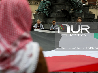 Participants in a pro-Palestinian protest gather on the Main Square and then proceed to the US Consulate and the Jagiellonian University in...