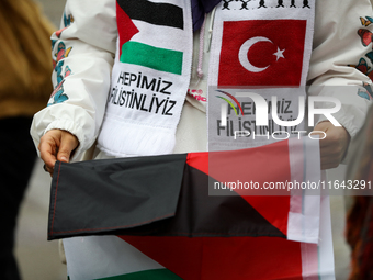 Participants in a pro-Palestinian protest gather on the Main Square and then proceed to the US Consulate and the Jagiellonian University in...