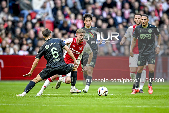 FC Groningen midfielder Stije Resink and AFC Ajax Amsterdam midfielder Kenneth Taylor play during the match between Ajax and Groningen at th...