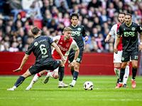 FC Groningen midfielder Stije Resink and AFC Ajax Amsterdam midfielder Kenneth Taylor play during the match between Ajax and Groningen at th...