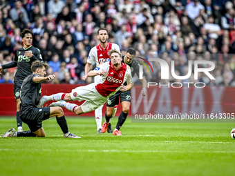 FC Groningen midfielder Johan Hove and AFC Ajax Amsterdam midfielder Kenneth Taylor play during the match between Ajax and Groningen at the...