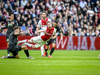 FC Groningen midfielder Johan Hove and AFC Ajax Amsterdam midfielder Kenneth Taylor play during the match between Ajax and Groningen at the...