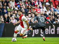 AFC Ajax Amsterdam defender Josip Sutalo plays during the match between Ajax and Groningen at the Johan Cruijff ArenA for the Dutch Eredivis...