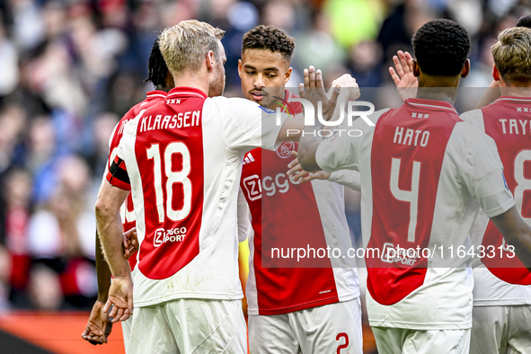 AFC Ajax Amsterdam midfielder Davy Klaassen and AFC Ajax Amsterdam defender Devyne Rensch participate in the match between Ajax and Groninge...