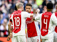 AFC Ajax Amsterdam midfielder Davy Klaassen and AFC Ajax Amsterdam defender Devyne Rensch participate in the match between Ajax and Groninge...