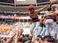 Members of Xiquets de Reus celebrate the victory after building a human tower during the Concurs de Castells competition in Tarragona, Spain...