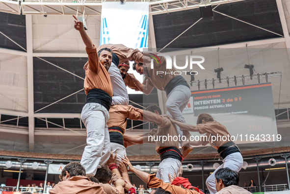 Members of Xiquets de Reus celebrate the victory after building a human tower during the Concurs de Castells competition in Tarragona, Spain...