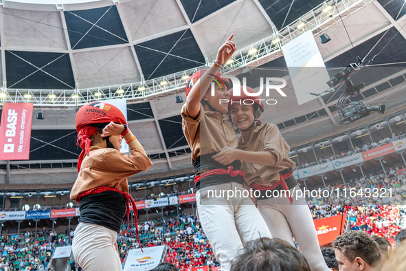 Members of Xiquets de Reus celebrate the victory after building a human tower during the Concurs de Castells competition in Tarragona, Spain...