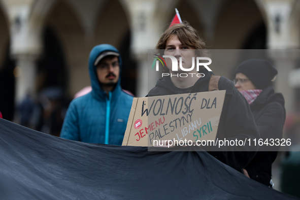 Participants in a pro-Palestinian protest gather on the Main Square and then proceed to the US Consulate and the Jagiellonian University in...