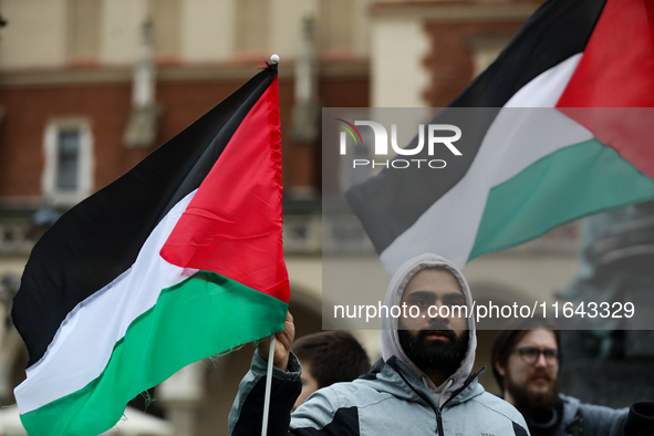 Participants in a pro-Palestinian protest gather on the Main Square and then proceed to the US Consulate and the Jagiellonian University in...