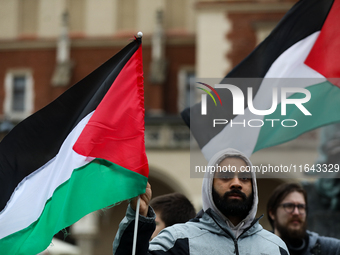 Participants in a pro-Palestinian protest gather on the Main Square and then proceed to the US Consulate and the Jagiellonian University in...