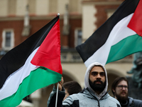 Participants in a pro-Palestinian protest gather on the Main Square and then proceed to the US Consulate and the Jagiellonian University in...