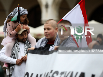 Participants in a pro-Palestinian protest gather on the Main Square and then proceed to the US Consulate and the Jagiellonian University in...