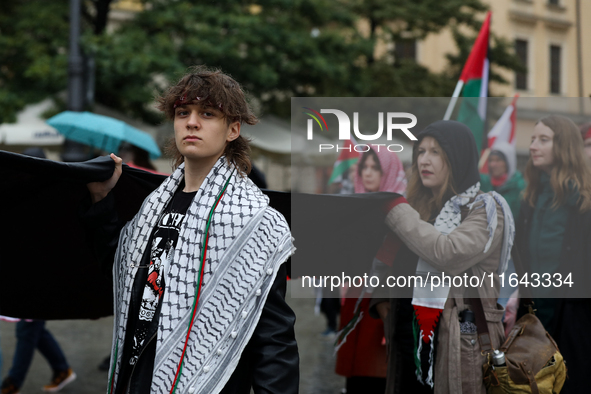 Participants in a pro-Palestinian protest gather on the Main Square and then proceed to the US Consulate and the Jagiellonian University in...