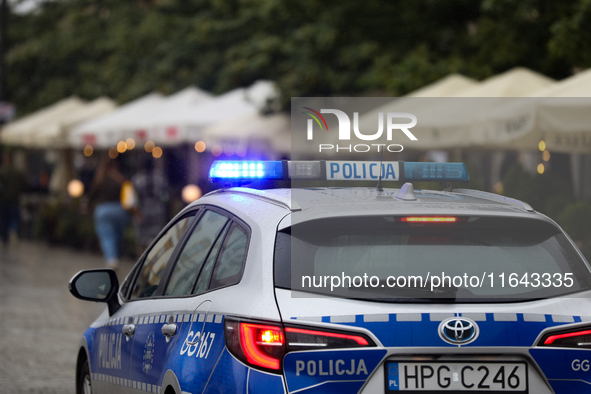 Police attend a pro-Palestinian protest, which takes place on the Main Square and then moves to the US Consulate and the Jagiellonian Univer...