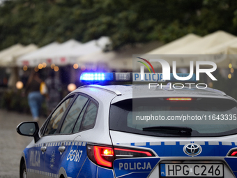 Police attend a pro-Palestinian protest, which takes place on the Main Square and then moves to the US Consulate and the Jagiellonian Univer...