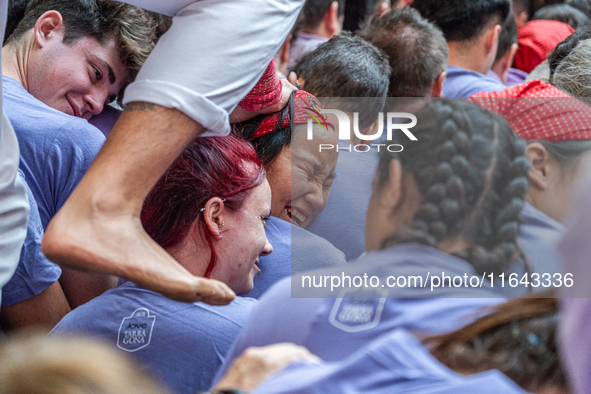 Members of Colla Jove Xiquets de Tarragona build a human tower during the Concurs de Castells competition in Tarragona, Spain, on October 6,...