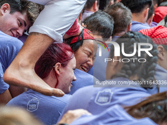 Members of Colla Jove Xiquets de Tarragona build a human tower during the Concurs de Castells competition in Tarragona, Spain, on October 6,...